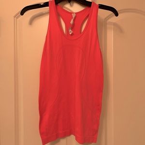 Lululemon workout top. Size 4. Pre owned.
